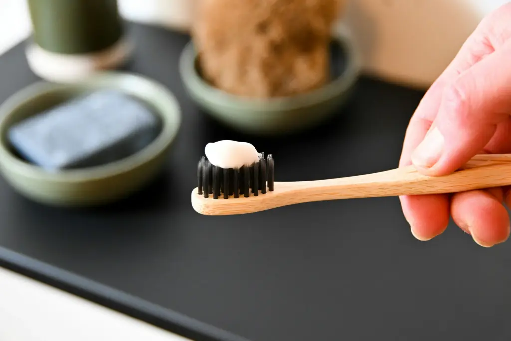 Toothbrush with toothpaste for daily whitening aftercare.