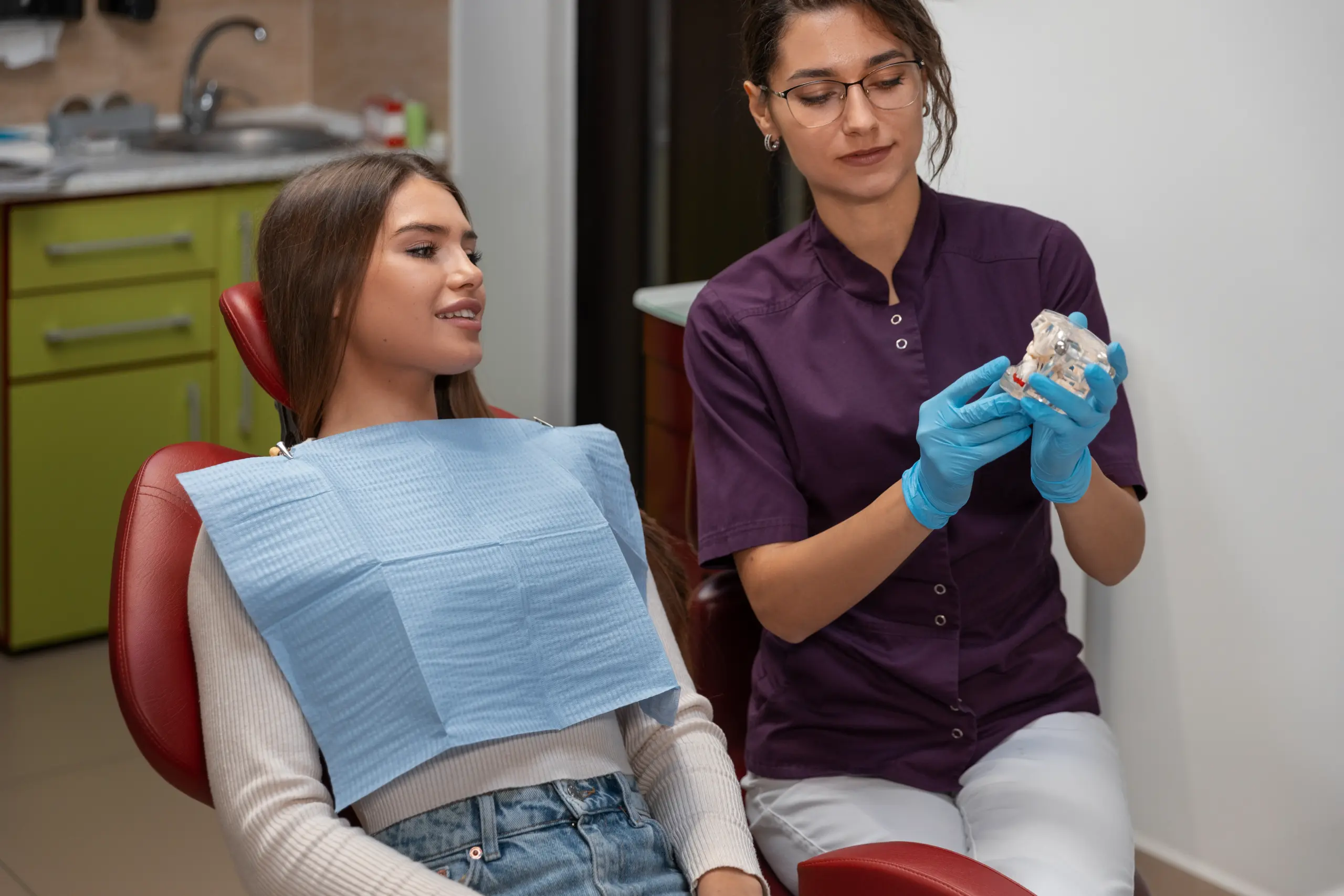 Dentist discussing hidden braces during an orthodontic consultation.